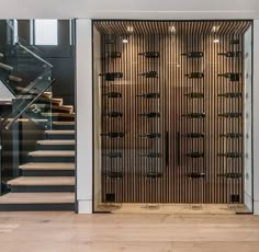 the entrance to an office building with stairs and glass doors