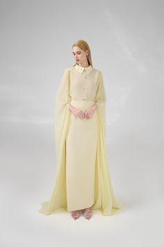 This chiffon set features a sheath silhouette and hanging sleeves, making it perfect for any formal occasion. The flowy, floor-length design is both elegant and comfortable, ensuring you look and feel your best all night long. The perfect combination of style and functionality. Length: 60cm (Front length of top), 107cm (Skirt) Elegant Chiffon Maxi Dress With Sheer Sleeves, Elegant Chiffon Gown With Cape Sleeves, Evening Cape Dresses In Georgette, Sheer Chiffon Floor-length Gown, Georgette Cape Evening Dress, Evening Georgette Dress With Cape, Elegant Sheer Chiffon Dress For Banquet, Evening Georgette Cape Dress, Elegant Sheer Chiffon Banquet Dress