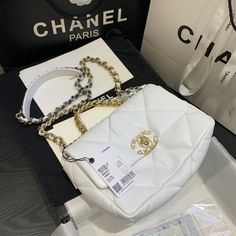 Detailed Features Most sought after release from the 19K collection! Chanel 19 flap bag in white GOATSKIN leather with 2 tone hardware in the SMALL size. Measurements: 16 x 26 x 9 cm / 6.2A€� x 10.1A€� x 3.5A€� Brand new, protective stickers still intact. Comes with complete set: box, Microchip, dust bag and Booklet. A Boogie Wit Da Hoodie, Makeup Cases, Chanel 19, Chanel Flap Bag, Luxury Purses, In My Bag, Chanel Bags, Diamond Quilt, Hermes Bag