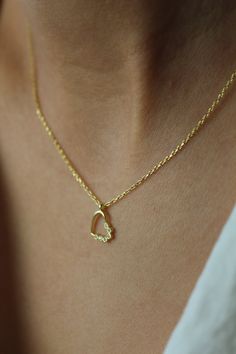 Beautiful minimalist heart beats for you 💛 Get this beautiful minimalist jewelry made with the quality of perfect elements✨ You can choose 925K Sterling Silver with the options of Gold, Rose Gold or White Gold colors. High quality jewelry for everyone 🤍  Details * 925K Sterling Silver Option → 14K Gold, Rose Gold or White Gold plated * Chain length is approximately 18 inches (16+2 in extender) / 45 cm (40+5 cm extender) * Time is everything! You will receive your package as soon as possible 🚚  * We care about the quality of metal to make sure it will last for a long time * We use enamel technique to color the jewelry and high quality zircons only * There can be tiny differences on each item. Length difference of the chain as well as color changes and shade differences of the stones and Minimalist 14k Gold Filled Open Heart Jewelry, Minimalist Tarnish Resistant 14k Gold Heart Necklace, Delicate Yellow Gold Sterling Silver Heart Necklace, Minimalist Gold Plated Heart Necklace For Everyday, Dainty 14k Gold Heart Necklace For Everyday, Everyday 14k Gold Dainty Heart Necklace, Minimalist 14k Gold Open Heart Jewelry, Everyday Dainty 14k Gold Heart Necklace, Minimalist 14k Gold-filled Heart Necklace