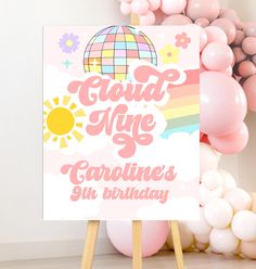 there is a sign that says cloud nine and has balloons around it with the words