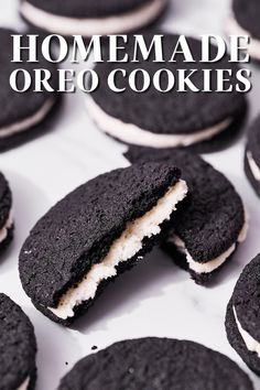 there are cookies that have been made to look like oreo cookies with white frosting