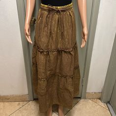 Zenana Mocha Woven Vintage Wash Tiered Ruffle Maxi Skirt 100% Cotton Size 1x New Top To Hem 39” Lenghth. Yellow Tint Brown Tiered Lined Skirt, Brown Lined Tiered Skirt, Brown Flowy Skirt With Elastic Waistband, Flowy Brown Skirt With Elastic Waistband, Summer Tiered Brown Maxi Skirt, Brown Tiered Maxi Skirt For Summer, Brown Maxi Skirt For Beach, Relaxed Brown Maxi Skirt For The Beach, Brown Skirted Beach Bottoms