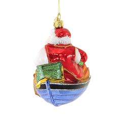 Immerse Yourself In A Truly Magical Sensation Of Holiday Magic With This Luxurious, Beautifully Designed Ornament From Poland. Decorate Or Celebrate With Leisure Time Santa. Before The Hectic Time Of The Holidays Santa And One Of His Elves Take Some Much Deserved R&R At The Lake. Their Blue Boat Has Brown Oars And Green Tackle Box. Santa Wear A Red Fisherman's Vest Trimmed In White Glitter. His Elf Wear Red And Green Waders. Santa And Friend Have Caught A Couple Of Fish To Take Back To Camp. Of Course Santa Boat Has A Holiday Wreath For Good Measure.. 4.5 In H X 2 In W X 5 In D. Purchase includes 1 Glass Ornament. Boat Lake, Blue Boat, Wear Red, Tackle Box, Holiday Magic, Santa Ornaments, Holiday Wreath, Leisure Time, White Glitter