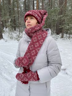 This Norwegian scarf hat with snowflakes is very warm and stylish. The scarf hat perfectly protects head and neck in cold and windy weather. It has a cotton inner layer, which is very soft and makes this cap more comfortable to wear. Perfect as a thoughtful gift or a statement piece for your own collection. This hat is pre-washed and ready to wear! Made of 100% natural sheep wool, they ensure both natural quality and environmental friendliness. Material: 100% wool Colours:  *Beige/Red (Red snowf Red Winter Scarves For Cold Weather, Red Scarves For Winter Cold Weather, Red Winter Beanie, Hand Knitted Winter Scarves, Red Knitted Scarf For Winter, Nordic Knitted Winter Beanie, Nordic Knitted Beanie For Winter, Hand Knitted Scarves For Winter, Christmas Leg Warmers