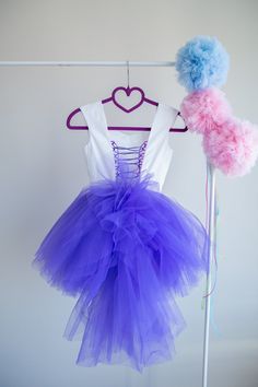 This Pinkie Pie Inspired Tutu dress is perfect for Birthday party, Halloween party and Dress up The dress is made with high quality fabrics. Top of the dress: 100% cotton fabric Bottom of the dress: High quality bridal nylon tulle fabric ( soft and not stiff) Lining: 100% cotton fabric There is a corset like closing at the back of the dress which lets to adjust the fit of the dress. There is an elastic band at the back of the waistband. The dress is easy to pull on and very adjustable. This dres Cute Sleeveless Fairy Dress For Party, Cute Fitted Corset Dress For Party, Princess Style Fairy Dress For Summer Costume Party, Cute Ruffled Fairy Dress For Costume Party, Fairy Style Summer Dresses For Costume Party, Fitted Purple Tulle Fairy Dress, Fitted Princess Corset Dress For Party, Fitted Princess Style Party Corset Dress, Fitted Princess Style Corset Dress For Party