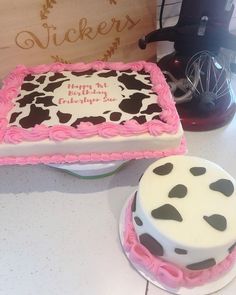 two cakes decorated with black and white polka dots