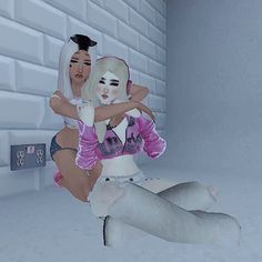 two animated women hugging each other in front of a white brick wall