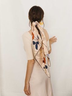 This extra large silk scarf in camellia design is for any style - a headscarf, a neck scarf or even a body wrap. Illustrating overlapping playing cards, but with color-contrasting flowers, she pulls you in by being so playful, invigorating, and seductive. And of course, Khaki and Caramel colors go with everything. The question isn't if you want, it is which one?  Product Description:  100% silk twill 90cm x 90cm ( 35"W x 35"L ) Hand-rolled edges with hand stitched finishing Playing cards crossover floral and leaves patterns   *Due to the handmade nature of the edges, the measurement may vary slightly. How to Wear a Silk Square Scarf: Dry clean Silk Scarf Outfit, Scarf Aesthetic, Silk Scarf Style, Silk Scarf Hair, Large Silk Scarf, Silk Neck Scarf, Silk Headscarf, Silk Square Scarf, Body Wrap