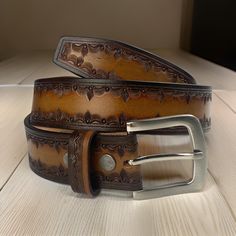 -  100% full grain genuine leather. -  Custom engrave option. - Width - 1.5 inches,  -  High quality REMOVABLE buckle. Personalized leather belt for men, custom belt for men with mono, monogramed leather belt, leather belt with initials, personalized belts Classic Hand Tooled Leather Belt Buckles, Custom Engraved Leather Belt Buckles, Classic Hand Tooled Brown Belt Buckles, Traditional Hand Tooled Leather Belt Buckles, Classic Brown Hand Tooled Belt Buckles, Traditional Brown Leather Belt Buckles, Western Leather Embossed Belt Buckles, Vintage Hand Tooled Leather Belt Buckles, Classic Embossed Leather Belt Buckles