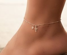 Dainty Silver Cross Anklet, Sterling Silver Anklets for Women, Anklets for Women, Silver Charm Anklet, Ankle Bracelet, Birthday Gift for Her This cross anklet has a solid sterling silver 925 chain. The charm on the ankle bracelet is also sterling silver 925. The anklet has an extension so it can be adjusted to fit comfortably with different shoes. There is an option for the type of stones that you would like on the anklet.I can also customize the size for you, so feel free to message me if you n Moonstone Anklet, Cross Anklet, Silver Ankle Bracelet, Anklets For Women, Charm Anklet, Beautiful Anklet, Ankle Jewelry, Anklets Boho, Women Anklets