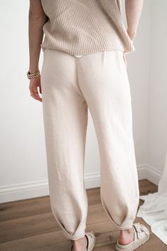 Elevate your wardrobe with the Della Sweater Lounge Set - Pants. These cozy pants are designed with a slight barrel style bottom, offering a relaxed yet stylish silhouette that's perfect for unwinding at home or stepping out for errands or a date night. With convenient pockets and a comfortable fit, these pants combine function with effortless style. Pair them with the matching top for a complete look that's as comfortable as it is chic. Fabric: 85% Polyester 15% Linen The Fit: Flowy, comfortabl Sweater Lounge Set, Sweater Lounge, Cozy Pants, Loungewear Dresses, Stepping Out, Sandals For Sale, Short Leggings, Lounge Set, Skirt Leggings