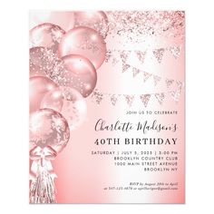 a pink birthday party with balloons and streamers