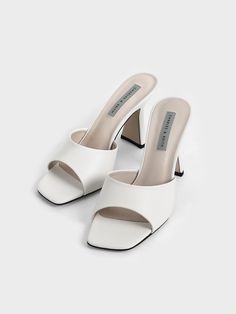 Cream Square Toe Heeled Mules - CHARLES & KEITH US Elegant Block Heel Mules, Elegant Fitted Mules With Block Heel, Modern Summer Mules With Block Heel, Modern Block Heel Mules For Summer, Trendy Open Heel Sandals With Sculpted Heel, Chic Fitted Mules With Square Toe, Chic Fitted Mules With Open Heel, Trendy Open Heel Heels With Sculpted Heel, Chic Fitted Open Heel Mules