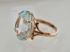 Classic Aquamarine Rings For Formal Occasions, Elegant Yellow Gold Ring With Aquamarine, Classic Aquamarine Wedding Ring, Oval Aquamarine Rings With Rose Cut Diamonds, Oval Aquamarine Ring With Rose Cut Diamonds, Classic Aquamarine Ring For Wedding, Vintage Solitaire Emerald Ring For Formal Occasions, Wedding Rings With Rose Cut Diamonds And Aquamarine, Elegant Round Aquamarine Ring