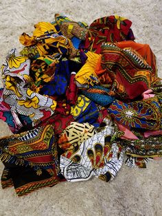 DESCRIPTION Scraps of African Ankara Print Fabric. This quality African print is 100% cotton. It's ideal for making African Clothing, African quilts, Upholstery, for home decoration, quilting and many more. The listing is for half pound, one pound and two pounds of scraps African Ankara Fabric *Each scrap measures 8-12in in length and 36-44in in width. 1/2 pound of scraps has 4 pieces, 1 pound of scraps has 8 pieces and 2pounds of scraps has 16 pieces *If you require more than what I have listed African Pattern Fabric, African Batik Fabric, African American Quilts, African Ladies, African Quilts, Fabric Bed Frame, American Quilt, Head Wrap Headband, Ankara Print