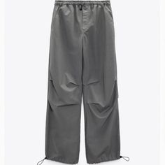 Zara Joggers Spring Straight Parachute Pants With Cargo Pockets, Spring Parachute Cargo Pants, Spring Wide-leg Cargo Pants, Spring Utility Wide-leg Pants, Spring Cargo Style Solid Wide Leg Pants, Solid Spring Cargo Style Wide Leg Pants, Spring Solid Color Cargo Wide Leg Pants, Utility Style Pants For Spring, Spring Utility Pants In Solid Color