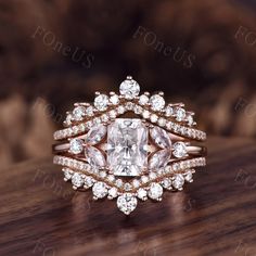 a diamond ring on top of a wooden table