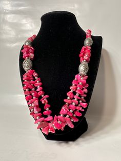 Please see the pictures as they are part of the description and feel free to ask any additional questions. An amazing combination of shapes and beads of pink and silver colors. All items are stored, sold, and shipped from a smoke-free, alcohol-free, and pet-free environment. Colors in images may differ slightly from items in real life due to the calibration of your screen. ** Some handmade items may have imperfections; this does not imply that they are damaged or improperly made; it is simply th Adjustable Pink Stone Necklace, Pink Adjustable Necklace With Stones, Adjustable Pink Necklace With Stones, Pink Stone Necklace With Adjustable Fit, Artisan Pink Jewelry With Round Beads, Bohemian Pink Jewelry With Gemstone Beads, Bohemian Pink Gemstone Bead Necklaces, Artisan Pink Gemstone Beads Jewelry, Spiritual Pink Beaded Necklaces With Natural Stones