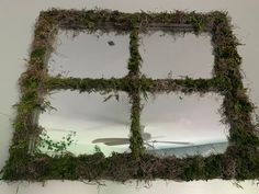 This is a mirror in the shape of a window, covered in moss to give it a cottagcore earthy feel Mirror With Plants Around It, Cottage Fairytale, Page And Plant, Fairytale Party, Mirror Window, Circle Mirror