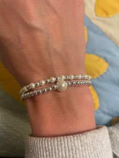 Handmade bracelet set.  2 Sterling silver bracelets with pearl accents  Bracelets are made on a stretch chord Silver Beaded Bracelets, Bracelet With Pearls, Pearl Beaded Bracelet, Kpop Diy, Bracelets Silver, Pearl Bracelets, Silver Bead Bracelet, Beaded Crafts, Bracelet Ideas