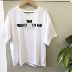 7 For All Mankind Graphic Oversized White Tee “The Possibilities Are Within” New With Tags, Has Never Been Worn! Women’s Size S Pit To Pit 26” Length 27” Oversized White Slogan Tops, Oversized Letter Print Athleisure Tops, Oversized Slogan Top For Athleisure, Oversized Athleisure Top With Slogan, Oversized Logo Print Tops For Everyday, Oversized Text Print Top For Athleisure, Athleisure Oversized Top With Text Print, White Tee, For All Mankind