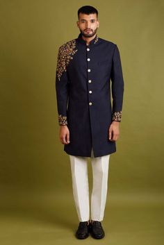 Chatenya Mittal-Navy Blue Embroidered Achkan Jacket Set-INDIASPOPUP.COM Traditional Blue Sets With Embroidered Sleeves, Fitted Long Sleeve Kurta With Embroidered Cuffs, Festive Blue Pants With Floral Embroidery, Fitted Sets With Embroidered Cuffs For Festive Occasions, Traditional Blue Embroidered Pants, Festive Blue Bandhgala With Floral Embroidery, Traditional Embroidered Blue Pants, Festive Blue Nehru Jacket With Floral Embroidery, Blue Sherwani With Zari Work For Winter