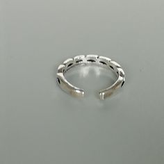 A sterling silver toe ring with twists.. 2mm wide. Weight: 0.95gm This is an open ended toe ring and can be adjusted to fit most feet. These toe rings are made of 925 hypoallergenic sterling silver. Comes with an oxidized finish. Please note this price is for ONE toe ring only. Sent in a gift box. I can include a personal message from you if needed You are welcome to contact me at... bhavnakwintra1956@gmail.com For more beautiful pieces from my shop, please browse 👇 TOE RINGS: https://www.etsy. Adjustable Silver Metal Toe Rings, Silver Open Ring Toe Rings, Silver Metal Open Toe Rings, Minimalist Silver Hypoallergenic Toe Rings, Minimalist Hypoallergenic Silver Toe Rings, Silver Minimalist Stackable Toe Rings, Minimalist Silver Stackable Toe Rings, Sterling Silver Toe Rings, Silver Toe Rings