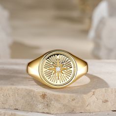 Ishtar is heavily associated with the planet Venus and the sacred feminin. Her primary element is the star, a representation of the brightest planet in the night sky. This ring incorporates stellar elements into an artful piece of jewelry. It also features a white stone, which is regarded as the stone of Venus.Carat Weight: 0.075 ctStone Size: 1.5 mmStone Type: Jeulia® StoneNumber of Stones: 1 Stone Shape: RoundStone Color: Diamond WhiteWeight: 4.8 gWidth: 3.1 mmHeight: 3.8 mmThickness: 1.2 mmMa Celestial Star-shaped Jewelry With Polished Finish, Celestial Star-shaped Signet Promise Ring, Celestial Star Shaped Signet Promise Ring, Celestial Star-shaped Signet Ring, Celestial Star-shaped Jewelry With Compass Design, Symbolic Star-shaped Jewelry With Polished Finish, Star Shaped Fine Jewelry With Polished Finish, Celestial Style Ring With Polished Finish, Celestial Style Polished Ring