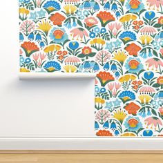 the wallpaper is decorated with colorful flowers