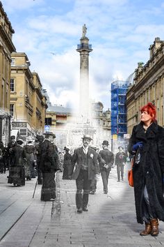 a woman with red hair is walking down the street in front of a fountain and buildings