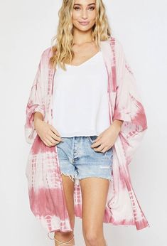 This beautiful shorter orange and pink tie-dye kimono is such a wonderful choice for summer and spring! This kimono looks fantastic with everything from dresses to jeans or over your swimsuit! We love throwing this kimono on over your favorite two-piece to head to the beach for sunrise! *The item is Pre-Ordered and expected to deliver mid-May!* 100% Polyester Hand wash cold / Dry Flat Patterns may vary Materials may have natural variations Colors may vary from different viewing devices. Oversized V-neck Spring Cover-up, Red V-neck Kimono For Summer, Flowy Hippie Summer Cover-up, Long Beachwear Cover-up For Spring, Pink Kimono For Beach Cover-up, Long Spring Loungewear Cover-up, Pink Kimono For Beach Cover-up During Beach Season, Spring V-neck Beachwear Kimono, Spring Cotton Kimono For Beach Cover-up