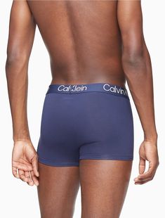 Eco-conscious with a luxurious feel, these Calvin Klein trunks are crafted from sustainably sourced modal with added breathability and long lasting fibers. Designed with a super soft recycled logo waistband, a sleek contoured pouch and a turnback hem for a clean finish. Comes in a 3-pack.  Material: 90% Modal, 10% Elastane. Recycled Logo, Recycle Logo, Eco Conscious, Swim Trunk, Trunk, Calvin Klein, Long Lasting, Sleek, Pouch