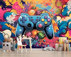 a wall mural with a video game controller painted on it's side and clouds in the background