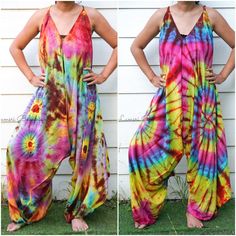 "💥One Size Fits Most Comfortable Tie Dye Hippie Jumpsuits Rompers Pants, Hippie Dress, Wide Legs Jumpsuits, Festival Clothings, Summer Clothing, Harem Dress, Beach Wear 👉One-of-a-kind hand dyed rompers 👉Fabric: 100% Soft and Breathable Rayon 👉Adjustable Tie shoulders 👉Boho/Hippie /Festival/Beach/Tropical/Fancy/UniqueTheme 👉Jumpsuit Length: 48\" 👉Straps Length: 19\" 👉Bust up to 55\" 👉Hip up to 60\" 👉 Tie Dye Method 👉The back is identical to front pattern 👉Flowy open legs 👉One Size Fi Bohemian Multicolor Jumpsuits And Rompers For Spring, Multicolor Hippie Jumpsuits And Rompers For Festival, Hippie Multicolor Jumpsuits And Rompers For Festival, Multicolor Maxi Jumpsuits And Rompers For Summer, Bohemian Jumpsuits And Rompers For Spring Festival, Bohemian Maxi Jumpsuits And Rompers For Spring, Flowy Bohemian Jumpsuits And Rompers For Summer, Spring Bohemian Maxi Jumpsuits And Rompers, Spring Bohemian Maxi Length Jumpsuits And Rompers