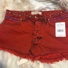 Gorgeous Brand New With Tags Never Worn Free People Shorts Button Fly Size 25 Beautiful Orange Color Read Tell $98. Beautiful Shorts Absolutely Stunning. Casual Mid-rise Bottoms For Festival, Bohemian Summer Bottoms With Button Closure, Bohemian Bottoms With Button Closure For Summer, Casual High-waisted Shorts For Festivals, Casual High Rise Shorts For Festival, High Rise Casual Shorts For Festival, Red Short-length Bottoms For Festival, Red Short Length Bottoms For Festival, Red Summer Bottoms With Button Closure