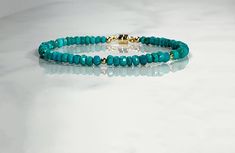 This bracelet is beautiful and dainty made up with genuine bluish green faceted turquoise measuring approximately 3-3.5mm with tiny accent 14k gold accent beads. Measures 6.5 inches total, but I am happy to make to any specification. Please leave a note at checkout with your preferred size. *Genuine Turquoise roundels (shown) *14k Solid gold magnetic clasp *14k Solid gold 2.5mm beads *Please note stone/bead size. Pictures are magnified to show detail.* *THIS LISTING IS FOR ONE BRACELET.* 🎁 Come Blue Green Turquoise, Dainty Bracelet, Bluish Green, Opal Bracelet, Birthstone Gifts, Pretty Bracelets, Dainty Bracelets, Genuine Turquoise, December Birthstone