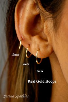 10k Solid Gold Continuous Hoops Available in Three Different Small Sizes 10mm, 12mm, 15mm. These Are Real Gold Daily Wear Sleeper Hoop Earrings For A Minimalist Look. Everyday Dainty Solid Gold Hoop Earrings Can Be A Perfect Gift For Your Loved Ones. Each Earring Is Stamped 10k To Prove Its Authenticity. Metal: Solid Gold Gold Purity: 10k Stamp: 10k Made : Made In Italy Thickness : 1.2 mm (All Are Equal In Thickness) Piercing Post Gauge : 0.6mm   PURCHASING OPTIONS  Single Piece - Refers to 1 in Real Gold Hoop Earrings, Double Piercing, Geek Jewelry, Eco Friendly Jewelry, Nose Stud, Hoop Earrings Small, Nose Piercing, Trendy Accessories, Gold Hoops