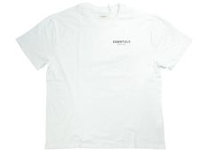 a white t - shirt with the words essential on it