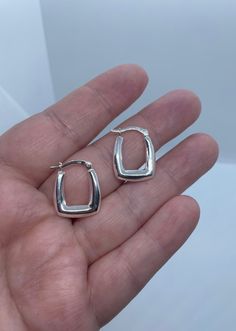 Sterling Silver, smooth rectangular shape hoop earring with clip closure. Approximate size: 21mm L x 16mm W x 4mm Thickness. These hoops are a perfect size and lightweight. They are comfortable to wear, yet in a minimalist but unique design to match your every outfit, giving a charm to the ensemble. ⭐️Free silver polishing cloth  ⭐️ It's completely natural for sterling silver to oxidize over time when it's exposed to air. Please, keep them in airtight plastic bag and use sterling silver polishing cloth to make them shine like new again. ⭐️ Each piece is packed in its own drawstring pouch and ordered is mailed out in bubble mailers to avoid any damages that can happen during transportation. Modern Clip-on Hoop Earrings For Everyday, Rectangular Hoop Earrings For Formal Events, Classic Square Everyday Earrings, Formal Rectangular Hoop Earrings, Modern Square Hoop Earrings For Everyday, Modern Hypoallergenic Rectangular Jewelry, Everyday Nickel-free Rectangular Hoop Earrings, Everyday Nickel Free Rectangular Hoop Earrings, Classic Square Hoop Earrings As Gift