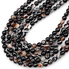 "Bead size: 4mm, 6mm, 8mm, 10mm and 12mm Strand length: approximately 15.5\" Price is per strand. Guaranteed 100% natural sardonyx not treated in any way... Superior AAA grade full of desirable veins, bands and eyes! We usually ship every day from Mon-Sat (except postal office holidays) and will do our best to ship on the same day when payment is received. Your satisfaction is our ultimate goal. Please feel free to email us your feedback, suggestions, questions, comments and how much you love yo Black Agate Gemstone Beads, Black Agate Beads With Natural Stones, Black Agate Round Beads Necklace, Black Agate Beads For Jewelry Making, Black Agate Beaded Necklace, Round 8mm Agate Beads, Eye Band, Amazing Eyes, Postal Office