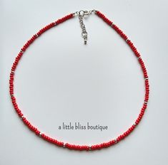 "This casual, easy-to-wear choker is the perfect complement to your favorite warm weather outfits! Made with red and silver-colored 3mm glass seed beads, with silver tone lobster clasp and 1.5\" extender chain. Available in 13\"-17\".  Free shipping to US addresses only." Weather Outfits, Warm Weather Outfits, Necklace Red, Beaded Choker Necklace, Glass Seed Beads, Choker Necklaces, Pink Leopard, Beaded Choker, Chain Styles