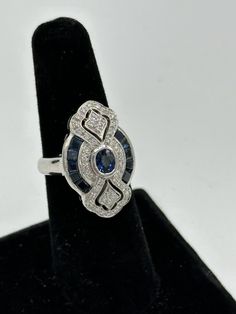 Levian 18K White Gold Blue Sapphire Diamond Ring Art Deco Style Sz 6  | eBay Blue Oval Sapphire Ring In Art Deco Style, Art Deco Blue Oval Sapphire Ring, Blue Oval Art Deco Rings, Blue Multi-stone Sapphire Ring In Art Deco Style, Elegant Multi-stone Sapphire Cluster Ring, Elegant Sapphire Multi-stone Cluster Ring, Art Deco Multi-stone Oval Sapphire Ring, Art Deco Oval Multi-stone Sapphire Ring, Art Deco Blue Sapphire Ring With Center Stone