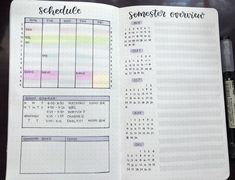 an open planner with some sort of schedule on it's page and pen next to it