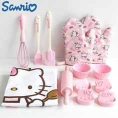 hello kitty kitchen accessories and utensils on a white table with hello kitty napkins