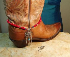 "Red 5mm Rondelles, 5mm Blue Turquoise, 925 Silver Turquoise Inlay Feathers Silver Lobster Clasp 14 1/2\" Boot Bracelet Handmade by me, \"Limpin' Lizard\". FREE SHIPPING. When ordering please let me know what size Boot you wear. Boot in the picture is a handmade 7 1/2 womens, which requires the 14 1/2\" Bracelet, smaller-a little shorter, & larger, a little longer. I will fit the Bracelet to match your Boot Size. FREE SHIPPING in the USA, $11 Everywhere else, It costs me $14.83 to ship to ot Western Style Red Jewelry As Gift, Shoe Bracelet, Cowgirl Things, Cowgirl Boots Wedding, Pearl Boots, Candy Toppers, Cowboy Accessories, Rodeo Jewelry, Dress Clips