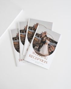 three wedding reception brochures sitting on top of each other