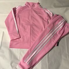 Authentic Adidas Girl Athletic 2 Piece Tracksuit % Authentic % Brand New With Tags % Polyester Color: Light Pink With White Lines ####Notice Jacket Is Size 6 And Pants Are Size 4### Smoke Free Home Go Ahead Make Me An Offer Nwt Nwt Nwt Nwt Nwt Nwt Nwt Nwt Sporty Sets With Pockets For Spring, Adidas Pink Sets For Spring, Adidas Pink Fitted Sets, Adidas Pink Spring Set, Adidas Pink Long Sleeve Sets, Adidas Fitted Winter Sets, Winter Adidas Fitted Sets, Casual Adidas Sets For Spring, Fitted Pink Adidas Sets