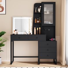 a black desk with drawers and a mirror on it in a room next to a potted plant