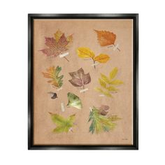 a framed painting with leaves on it